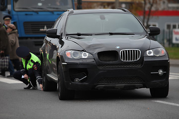 Image showing  car hit a pedestrian in a crosswalk