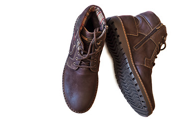 Image showing Mens shoes for winter on a white background.