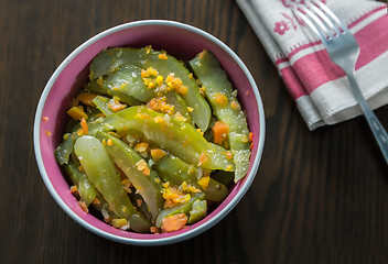 Image showing Marinated cucumbers with carrots and spices.