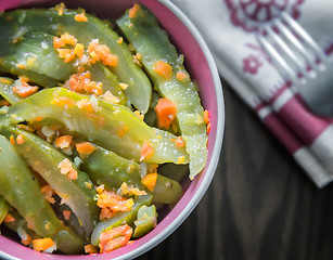 Image showing Marinated cucumbers with carrots and spices.