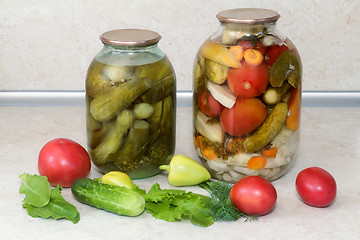 Image showing  A variety of canned vegetables in glass jars.