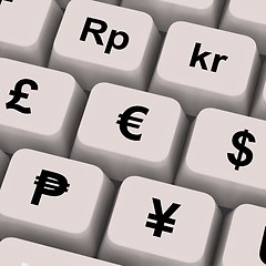 Image showing Currency Symbols On Computer Keys Showing Exchange Rates