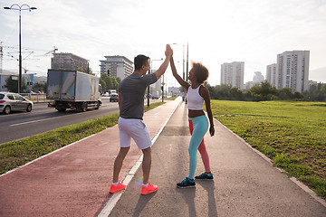 Image showing couple congratulating on morning run ginis