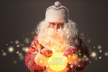 Image showing happy Santa Claus looking at camera