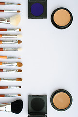 Image showing makeup brush and cosmetics, on a white background