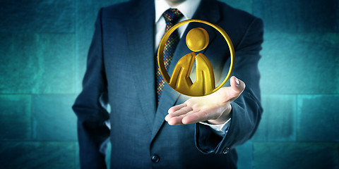 Image showing Business Man Offering A Golden Office Worker Icon