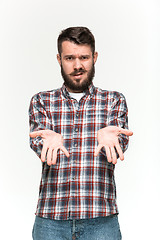 Image showing Man is looking pouter. Over white background