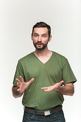 Image showing Man is looking pouter. Over white background