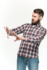 Image showing Man is looking scared. Over white background