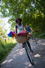 Image showing Young  couple having joyful bike ride in nature