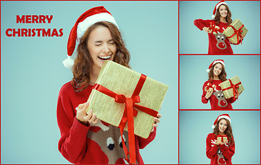 Image showing Girl dressed in santa hat with a Christmas gifts