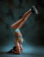 Image showing Attractive girl dancing twerk in the studio