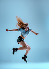 Image showing Attractive girl dancing twerk in the studio