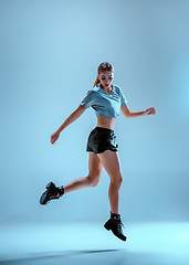 Image showing Attractive girl dancing twerk in the studio