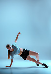 Image showing Attractive girl dancing twerk in the studio