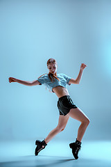 Image showing Attractive girl dancing twerk in the studio