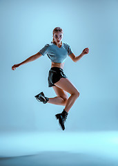 Image showing Attractive girl dancing twerk in the studio