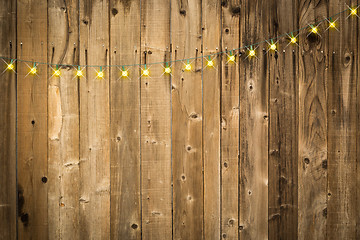 Image showing Lustrous Wooden Background with String of Lights