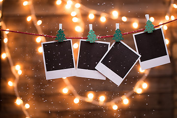 Image showing Blank instant photographys with garland