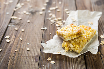 Image showing Cereal bar on wooden table