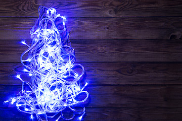 Image showing Christmas garland shining blue color