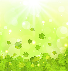 Image showing Glowing background with shamrocks for St. Patrick\'s Day