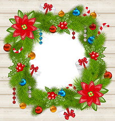 Image showing Christmas frame with traditional elements on wooden background