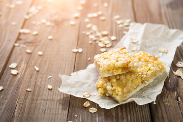 Image showing Granola cereal on wooden table