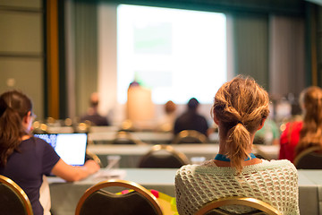 Image showing Audience in lecture hall participating at business conference.