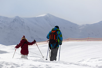 Image showing Father and daughter on ski resort after snowfall
