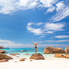 Image showing Woman enjoying Anse Lazio picture perfect beach on Praslin Island, Seychelles.