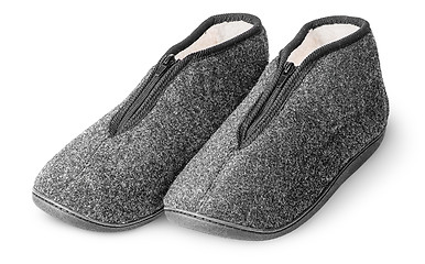 Image showing One pair comfortable dark gray slippers with fur