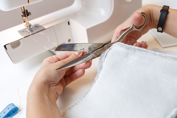 Image showing Girl background of sewing machine