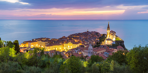 Image showing Romantic colorful sunset over picturesque old town Piran, Slovenia.