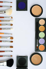 Image showing makeup brush and cosmetics, on a white background