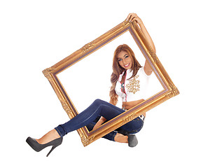 Image showing Woman sitting with picture frame.