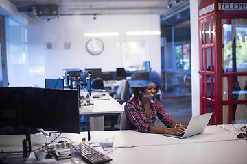 Image showing portrait of a young successful African-American woman in modern 