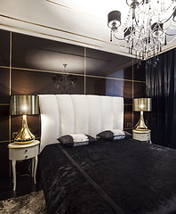 Image showing  Luxury bedroom interior with golden lights