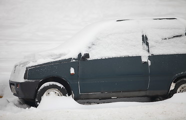 Image showing  small car under snow