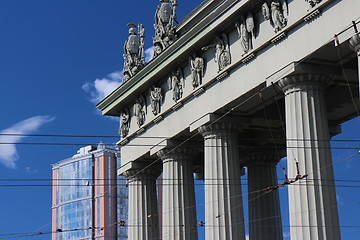 Image showing  Triumphal Gate and modern building cityscape