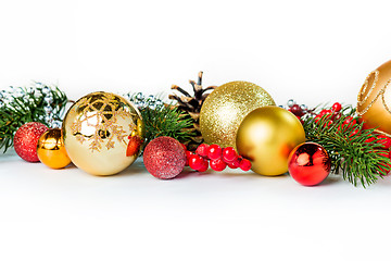 Image showing Gold Christmas balls on white