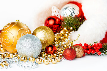 Image showing Gold Christmas balls on white