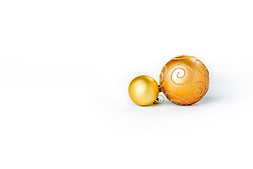 Image showing Gold Christmas balls on white