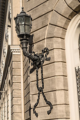 Image showing Antique forged lantern on the wall of a building in Riga