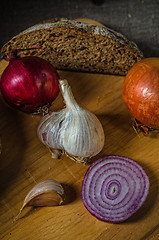 Image showing Still life with homemade bread and vegetables