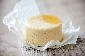 Image showing fresh cheese on wooden table