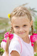 Image showing Portrait of a beautiful six year old girl with blond hair