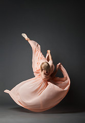 Image showing Woman dancing in light dress