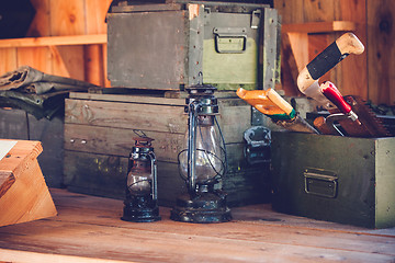 Image showing Old lanterns in a wooden barn