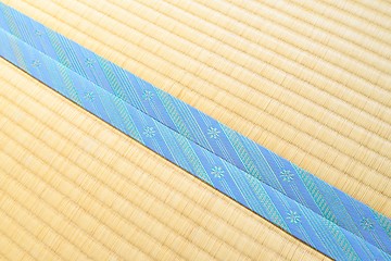 Image showing Tatami with light blue edging, ribbon